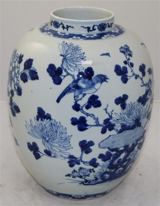 A Chinese blue and white ovoid jar, Kangxi mark, late 19th century, 32cm, wood stand